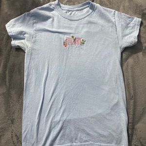 Small light blue neon riot t-shirt